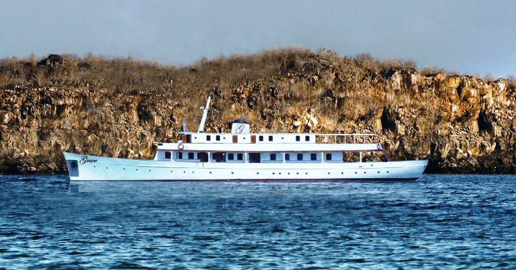 classic yacht GRACE anchors on a private yacht charter in the Galapagos Islands