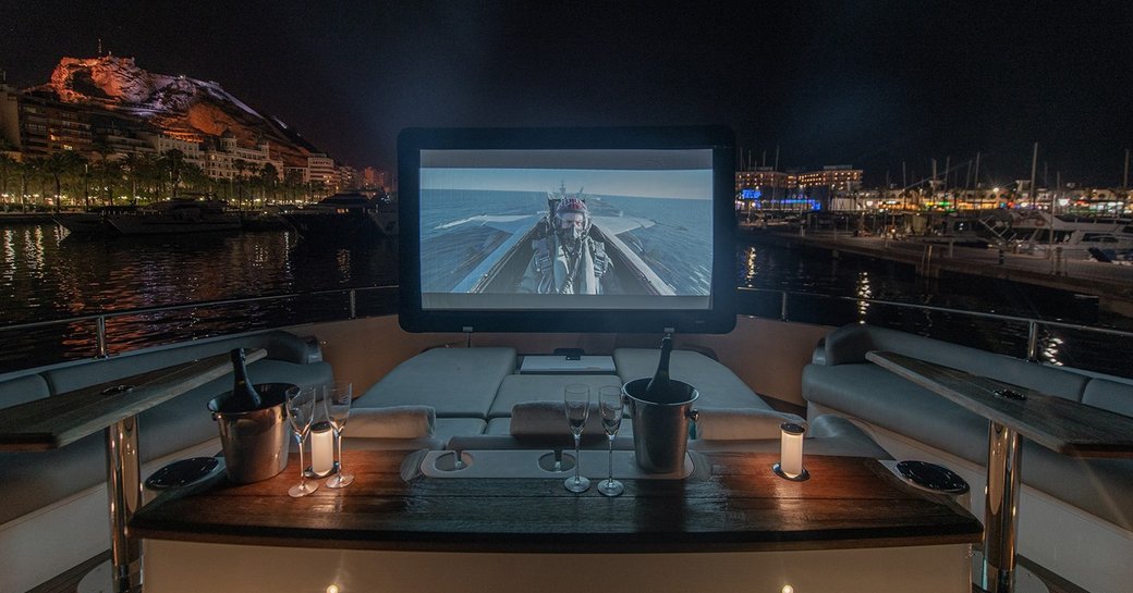 outdoor cinema set up onboard luxury charter yacht WYLDECREST