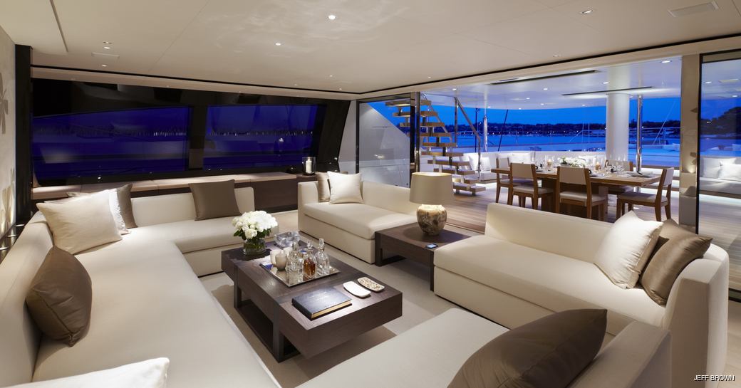 Main salon and alfresco dining area on luxury yacht TWIZZLE