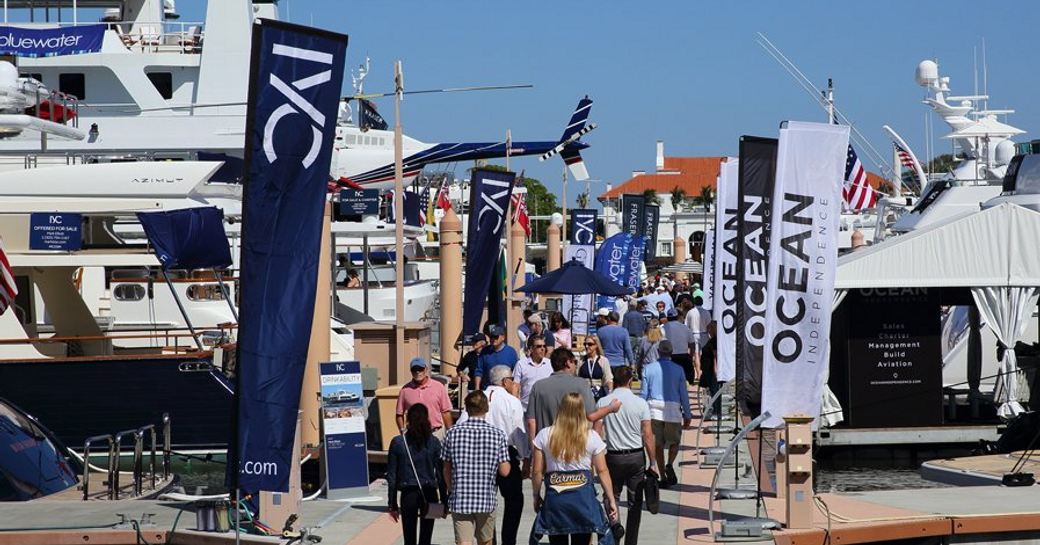 busy boardwalks lined with top brokerage firms at the Palm Beach Boat Show 2018