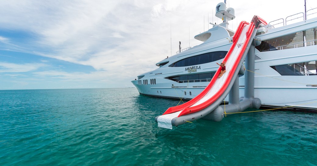 Superyacht 'Amarula Sun' with an inflatable slide attached to her sundeck