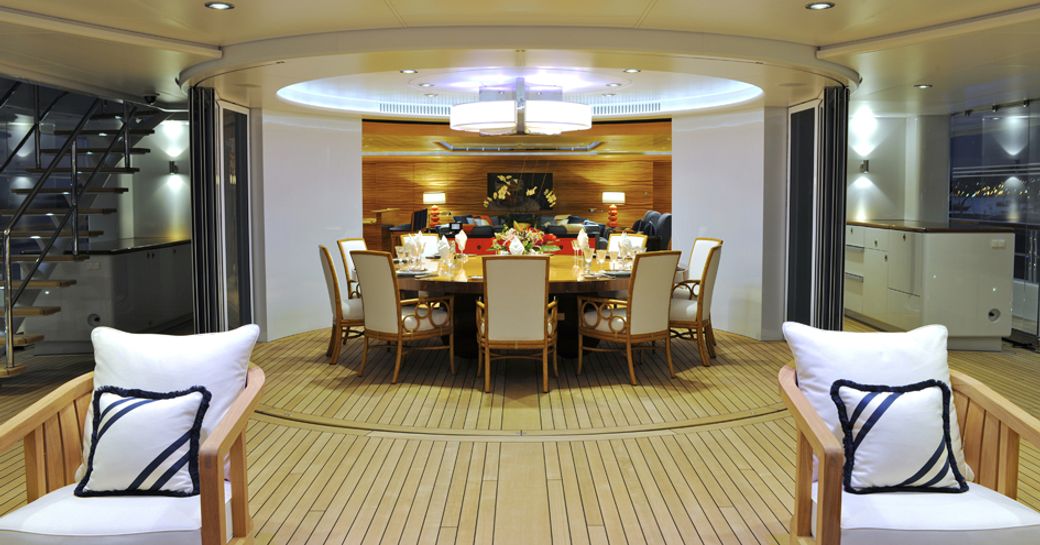 semi-alfresco dining area on upper deck of luxury yacht TV
