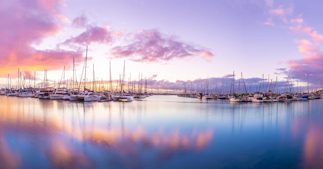 Yachts docked at Australian harbor at sunrise