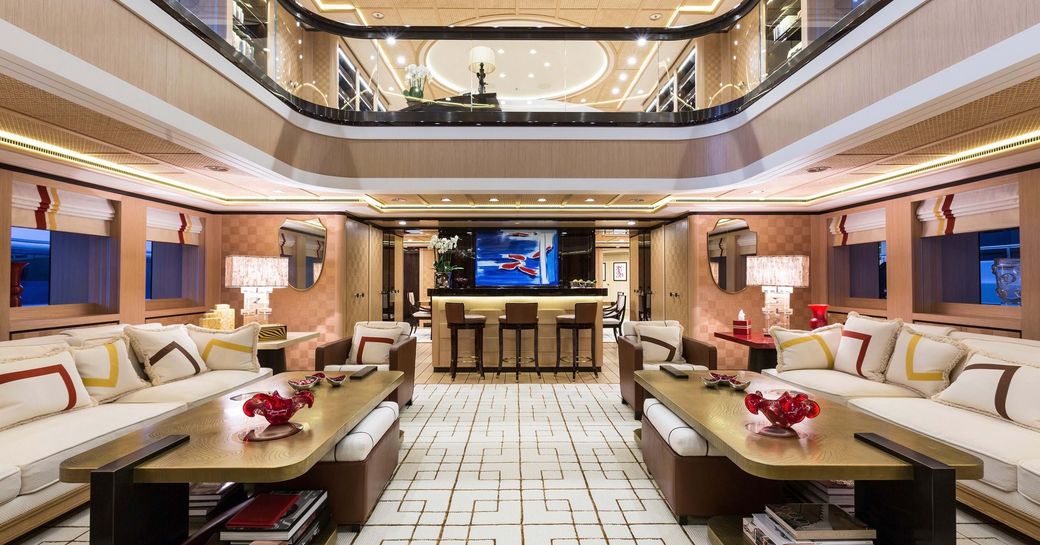 Main salon onboard charter yacht AXIOMA, with seating to port and starboard
