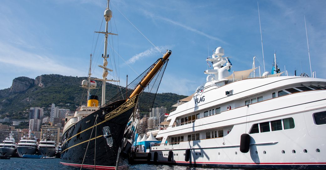 Superyachts NERO and FLAG berthed at the Monaco Yacht Show