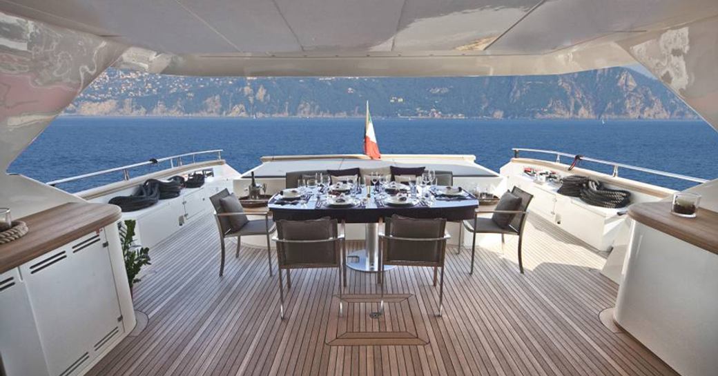Alfresco dining on deck of luxury yacht TOBY