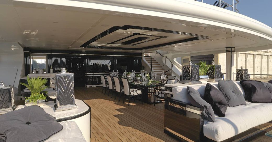Superyacht Silver Angel outside deck area with sofas and tables