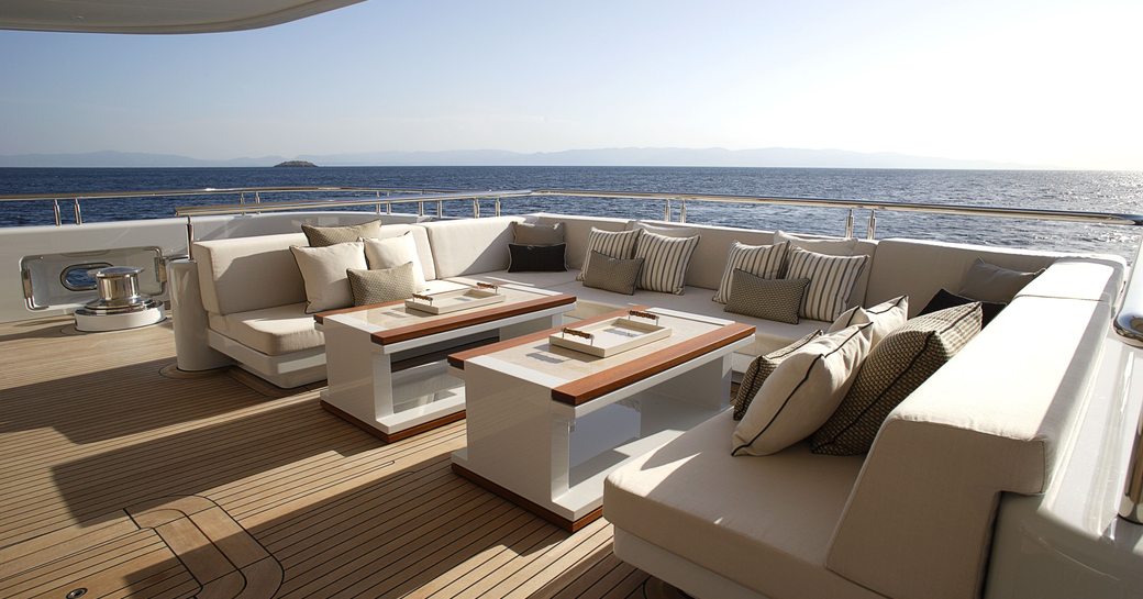 Sundeck lounging area on board luxury yacht HONOR