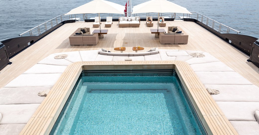Pool and sun pads aboard luxury yacht LUNA