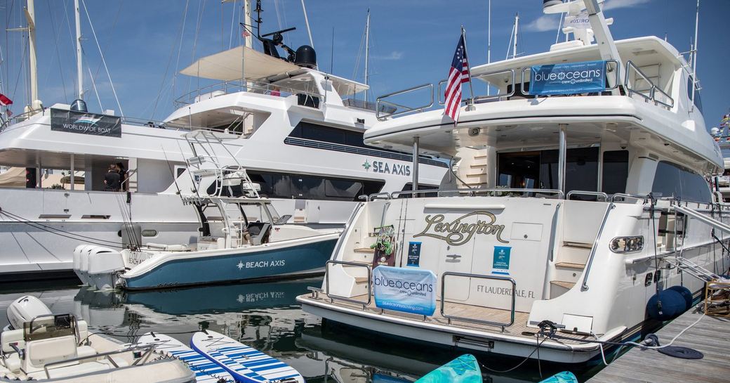 Aft view of motor yacht charters berthed at the Newport Charter Yacht Show