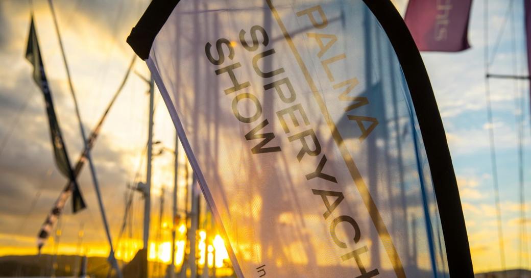 Palma Superyacht Show flag with sunset in the background