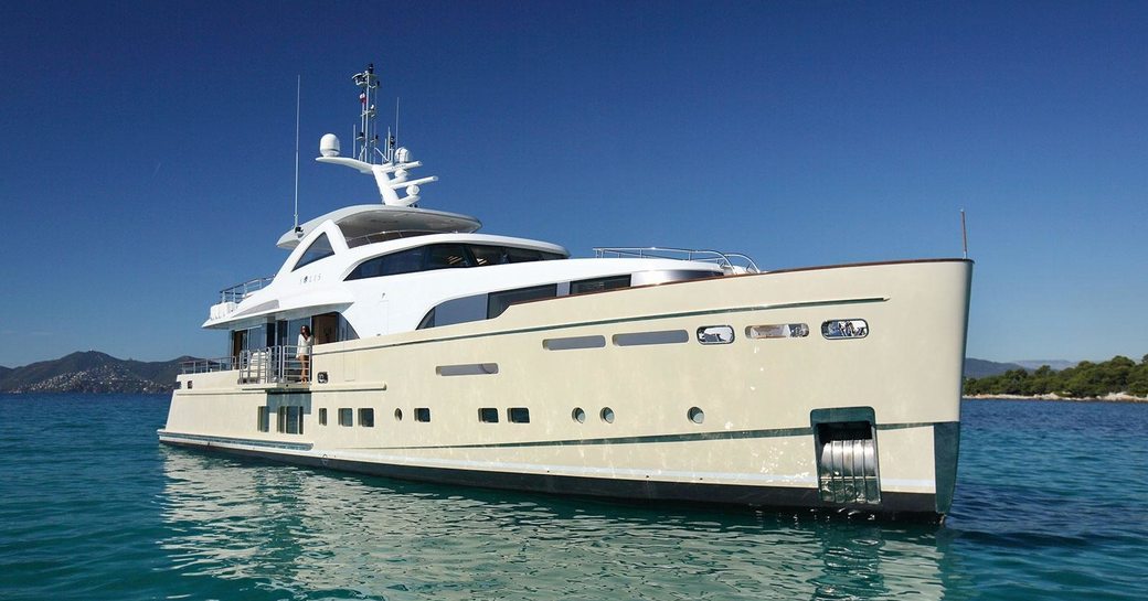 superyacht SOLIS anchors in the Caribbean during a luxury yacht charter