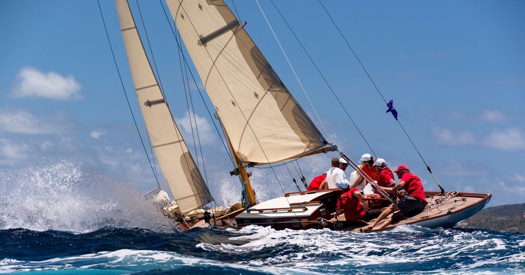 Classic sailing yacht heeling over at the Antigua Classic Sailing Regatta