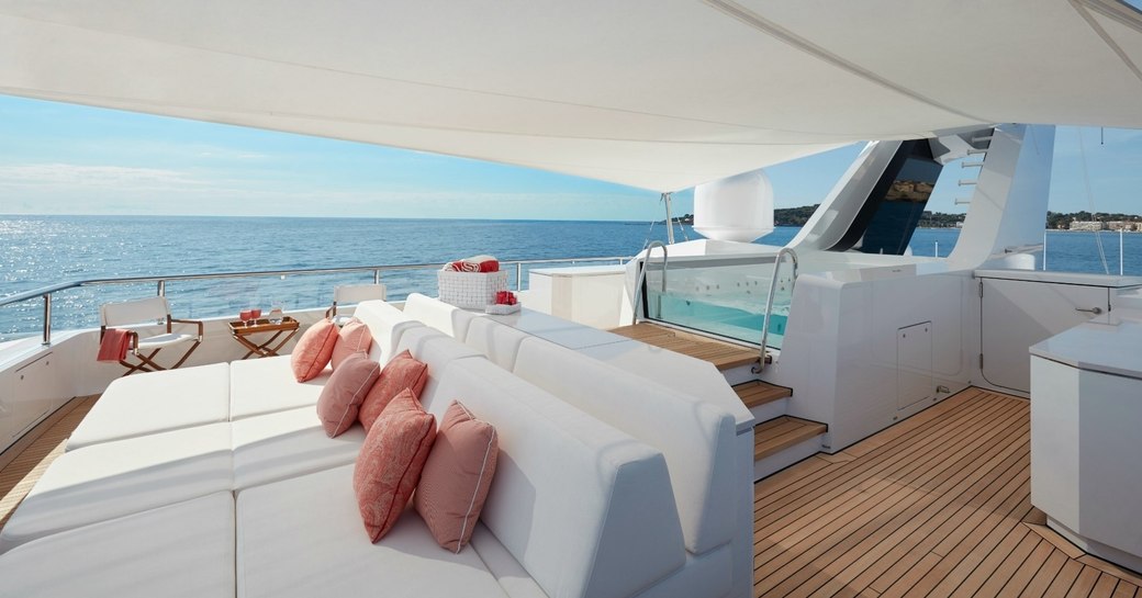 Jacuzzi and sunpads on sundeck of superyacht JOY