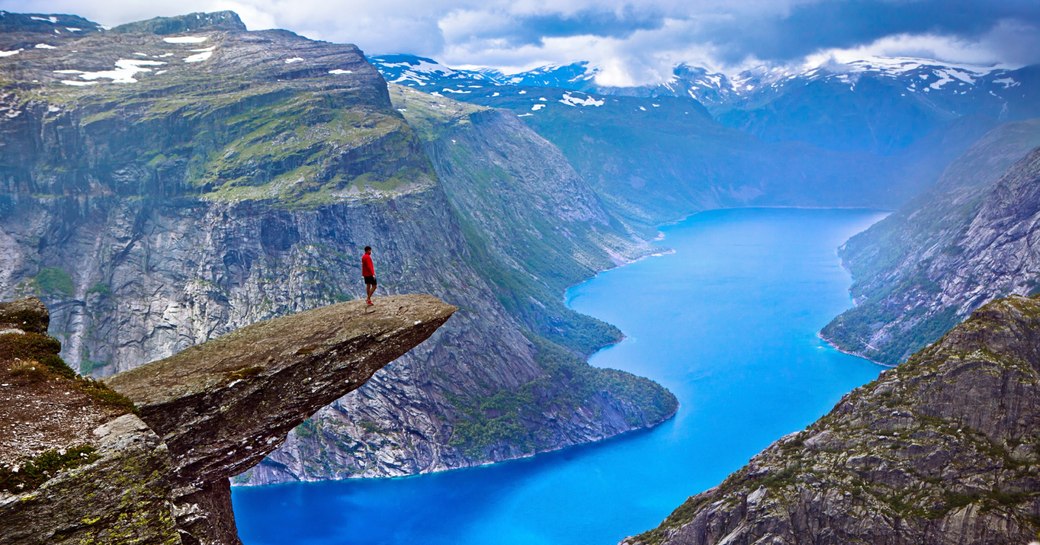 hiker on Trolltunga rock, Norway