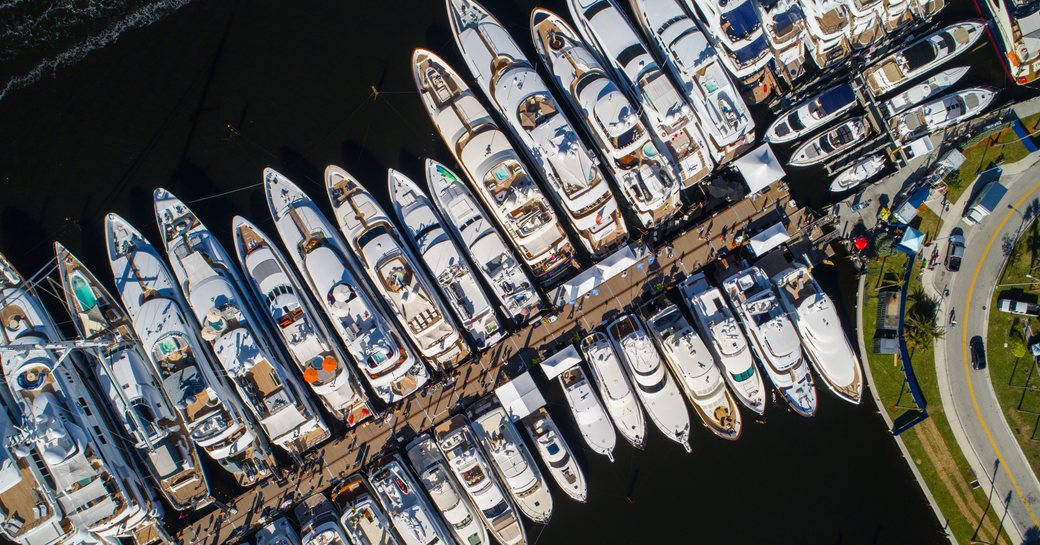 drone shot of superyachts lined up for the Fort Lauderdale International Boat Show 