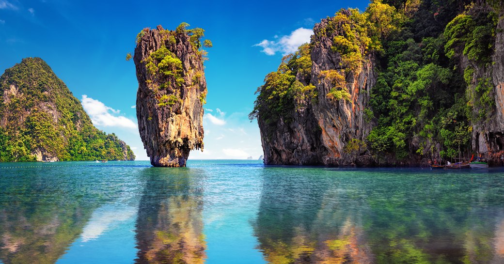 Beautiful nature of Thailand. James Bond island reflects in water near Phuket