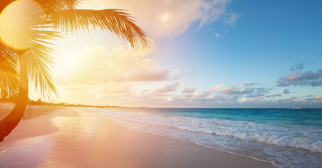 Beautiful sunrise over tropical beach in Caribbean