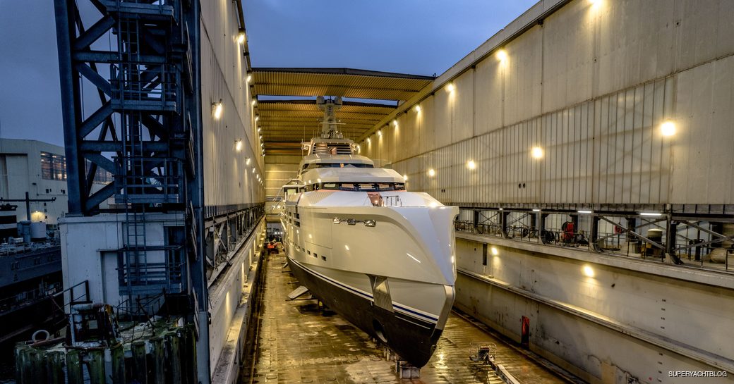 lurssen expedition yacht norn in floating dock in the german shipyard