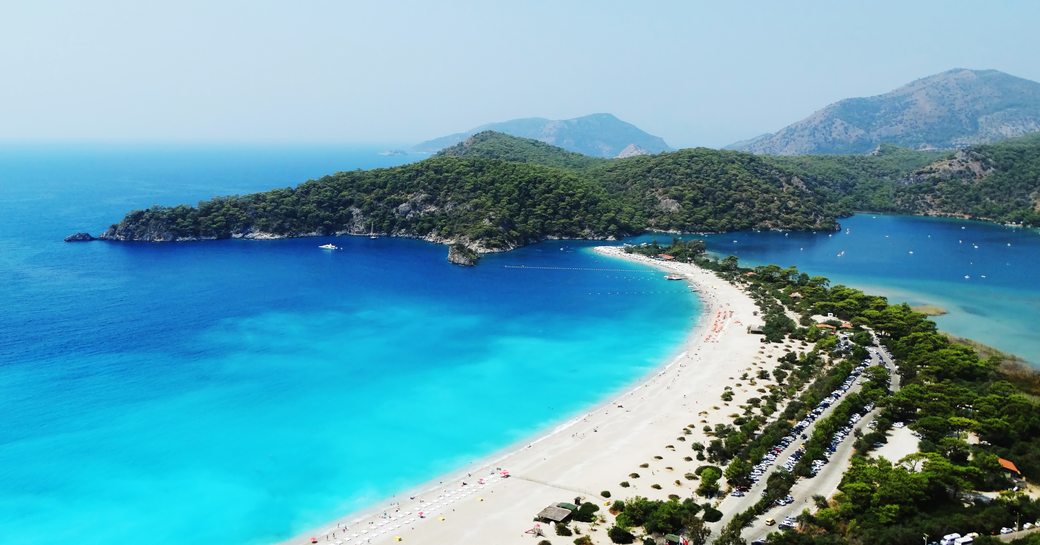 Aerial view looking down on a sweeping Turkish coastline
