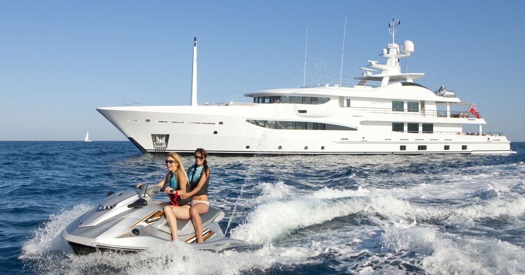 charter guests aboard superyacht SPIRIT take to the jet ski