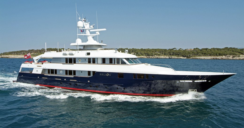 Charter yacht HELIOS 2 underway, surrounded by sea