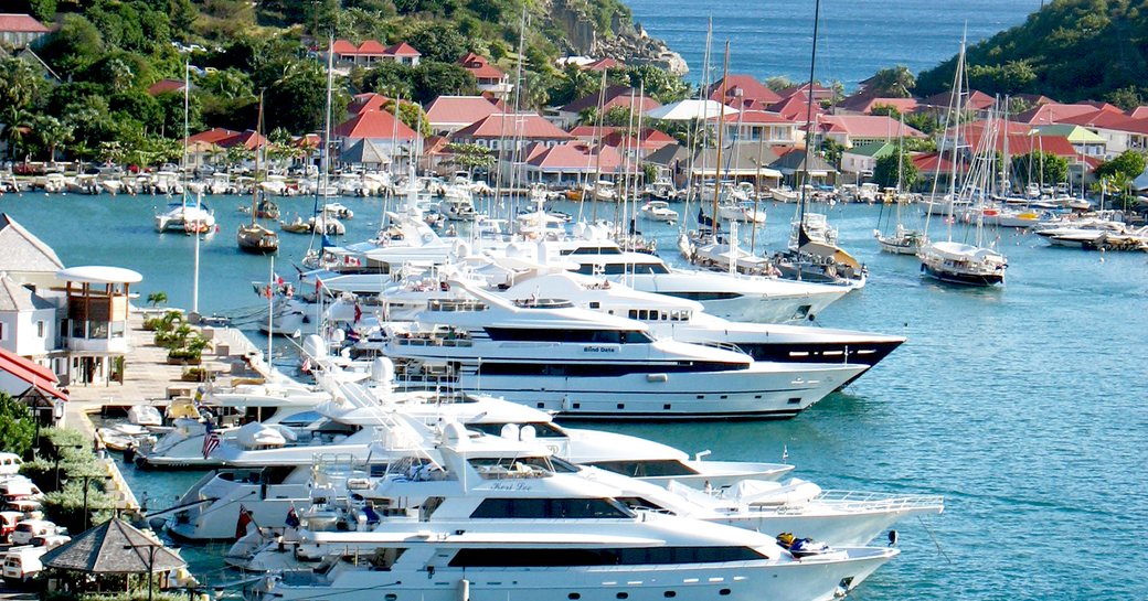 Luxury yacht charters berthed in Gustavia Harbor