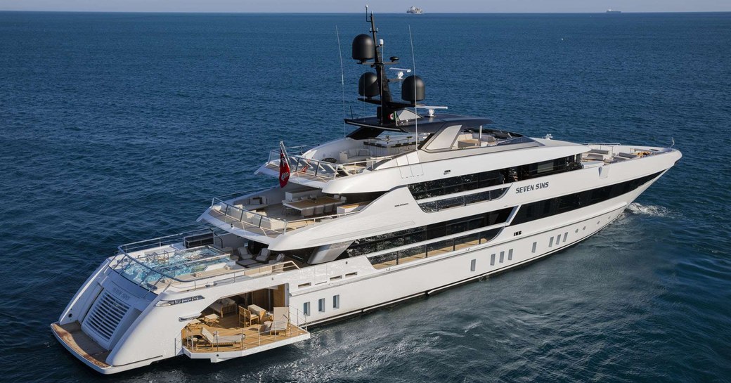 Superyacht Seven Sins anchors on a luxury yacht charter
