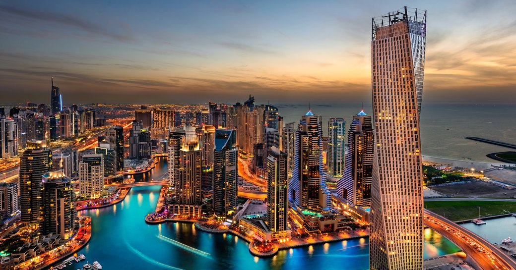 Dubai marina and cityscape as the sunsets