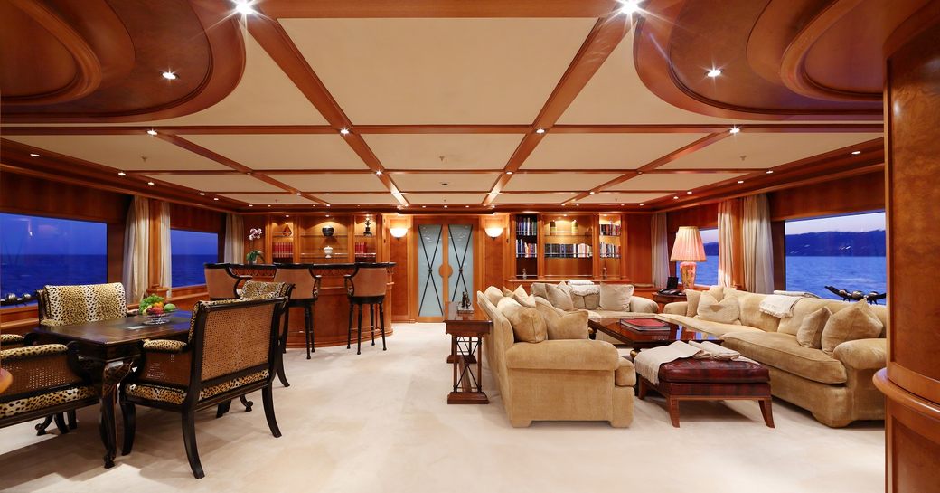 classically styled skylounge with bar and seating aboard superyacht ELENI 