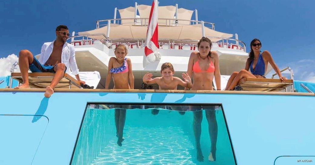 Guests enjoying the pool onboard MY Axioma