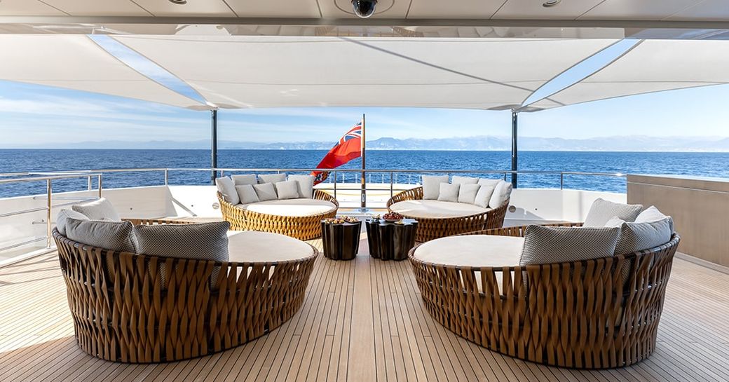 Alfresco seating area onboard charter yacht LA DATCHA