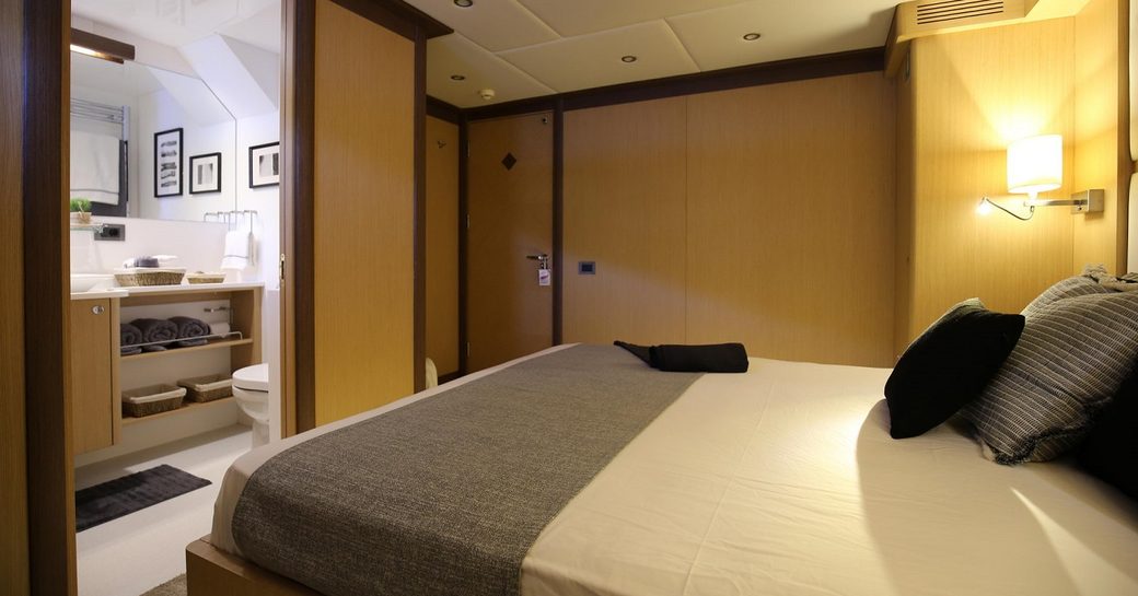 Ambiently lit cabin on Superyacht Ottawa IV with view into en-suite