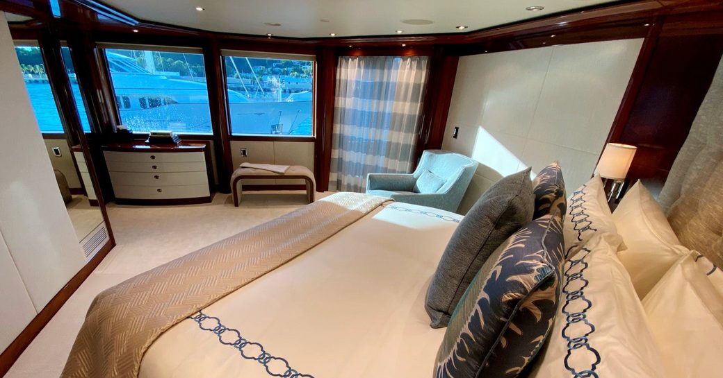 Double bed with views to sea on superyacht Chasing Daylight