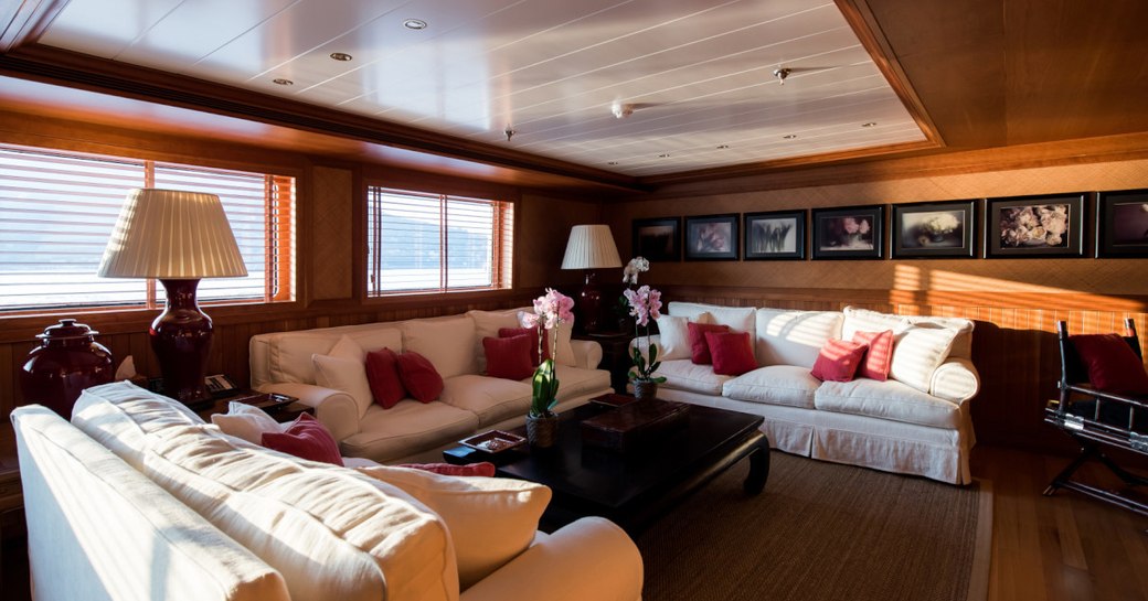 Elegant interior with sofas and tables on superyacht Bleu De Nimes