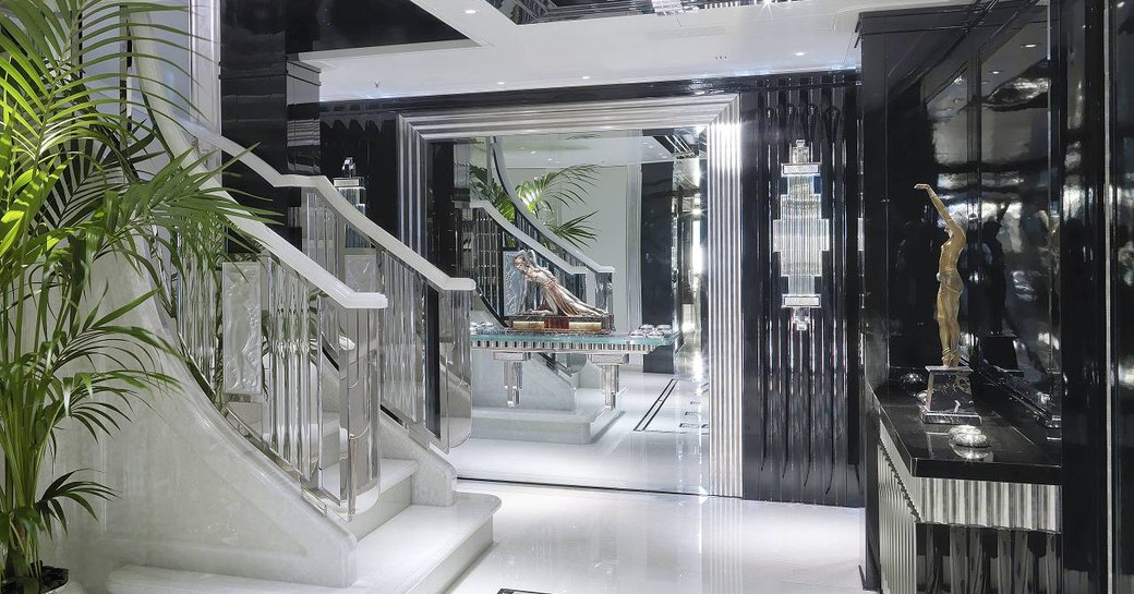 Superyacht Silver Angel interiors, showing staircase and elegant decor