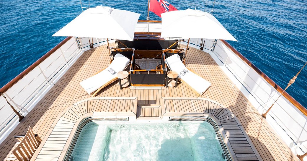 Jacuzzi and sun loungers aboard luxury yacht TALITHA 