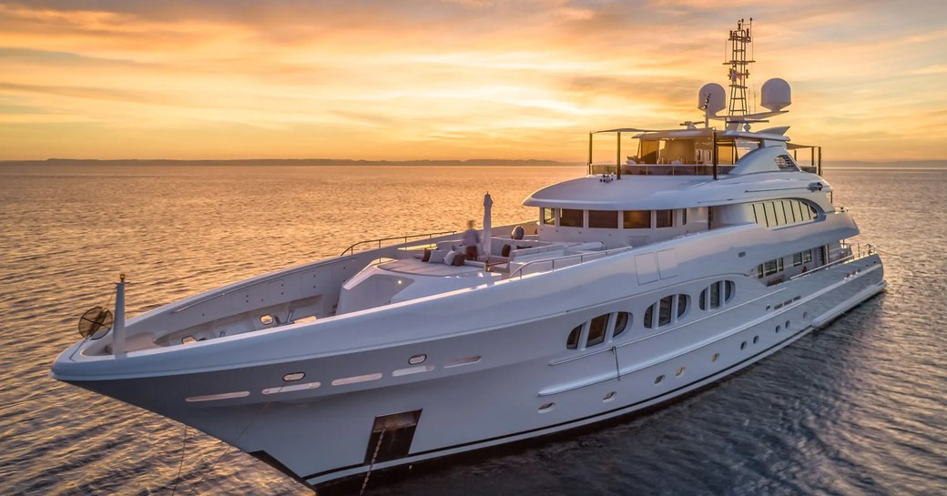 Odyssea yacht at sunset