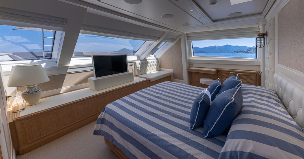 Bedroom on Motor yacht 'My Way' with sea views and large flatscreen TV
