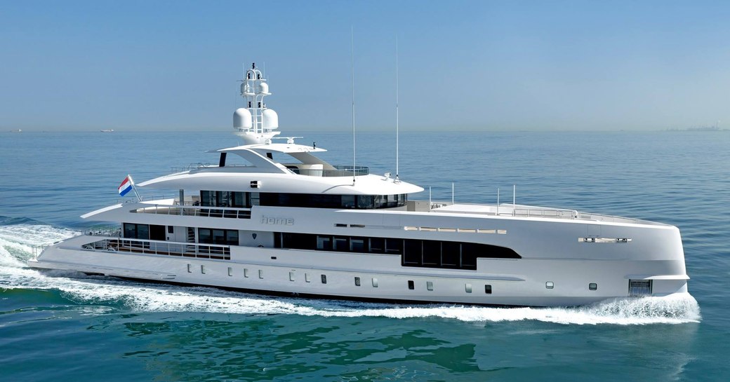 Charter yacht HOME underway, surrounded by sea