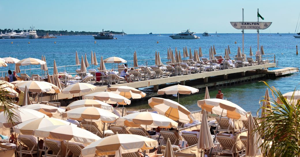 Private beachfront with parasols in Cannes, France