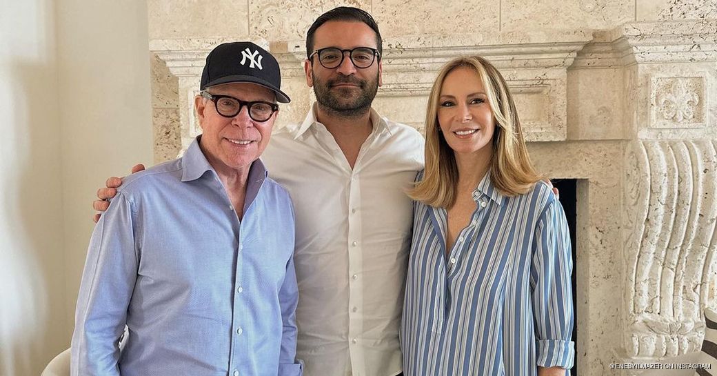 Yilmazer standing with Tommy Hilfiger and his wife after interview about FLAG 
