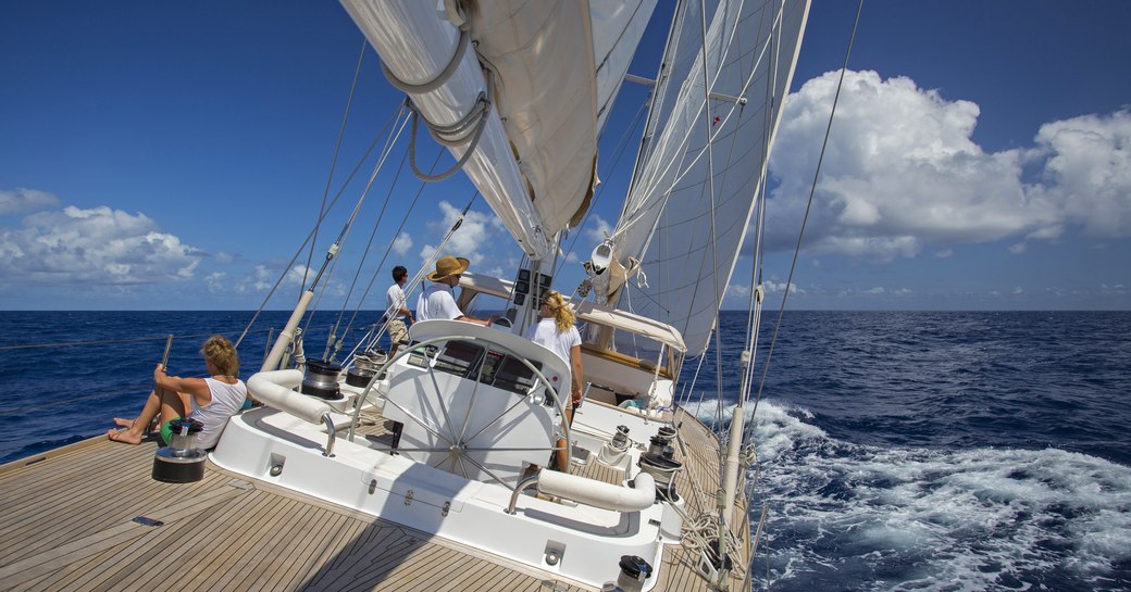 all hands on deck aboard JUPITER as she cuts through the Caribbean waters