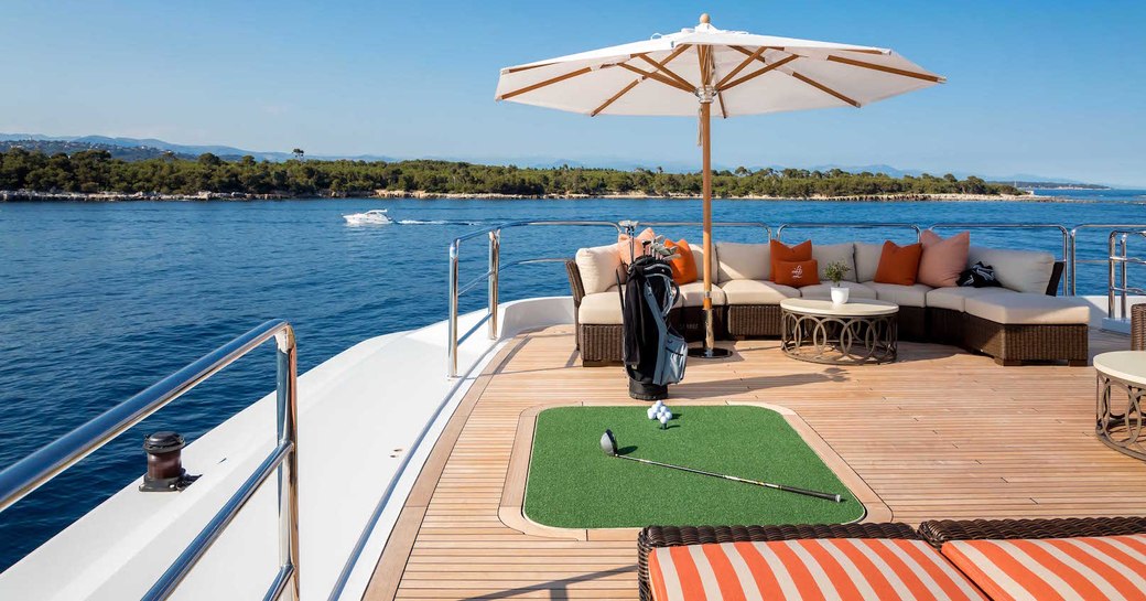 superyacht with golf course