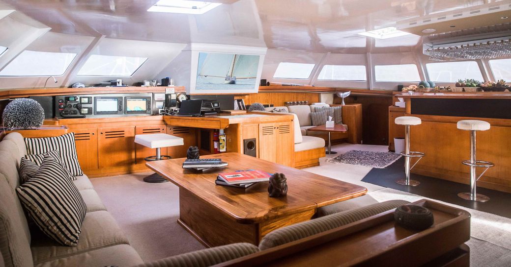 L-shaped sofa, bar and seating area on board charter yacht Lone Star 