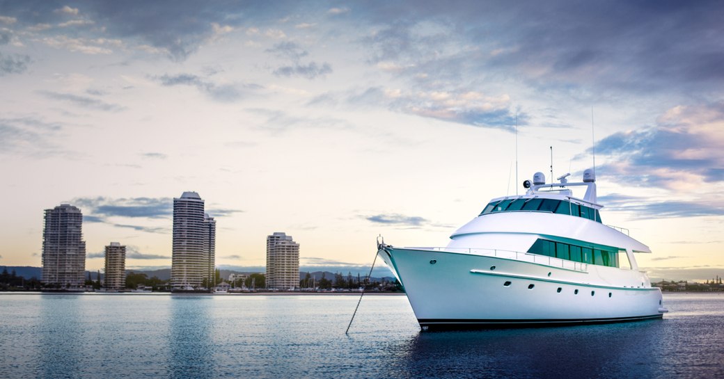 motor yacht ‘Laura J’ anchored along the Gold Coast on a luxury charter vacation