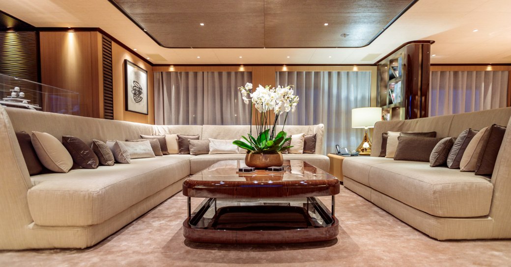 lounge area in the main salon on board motor yacht VERTIGE