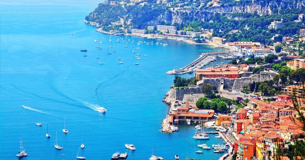 Cote d'Azur France. View of luxury resort and bay of French riviera - Villefranche-sur-Mer is situated between Nice city and Monaco. Mediterranean Sea