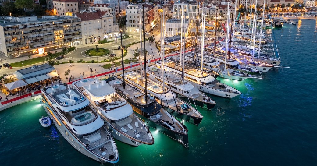 Superyacht charters berthed in Split at dusk