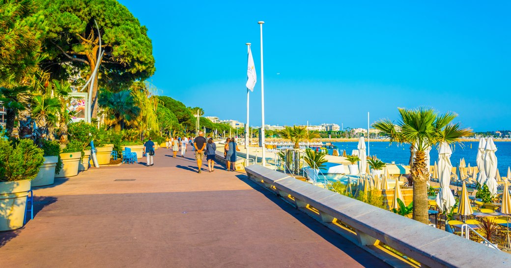 People walking along La Croisette in Cannes